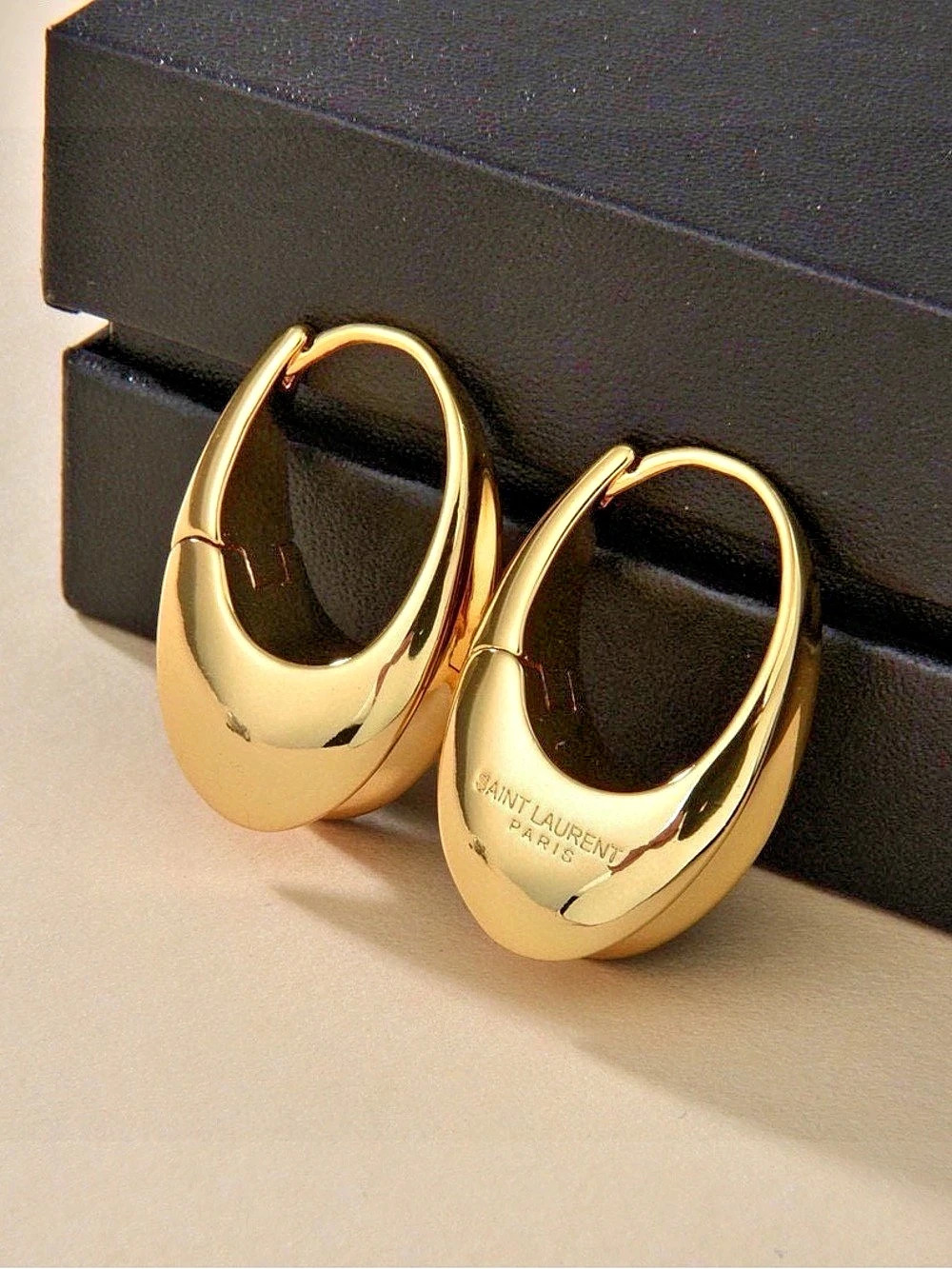 Saint Laurent Teardrop Hoop Earrings in Metal Gold